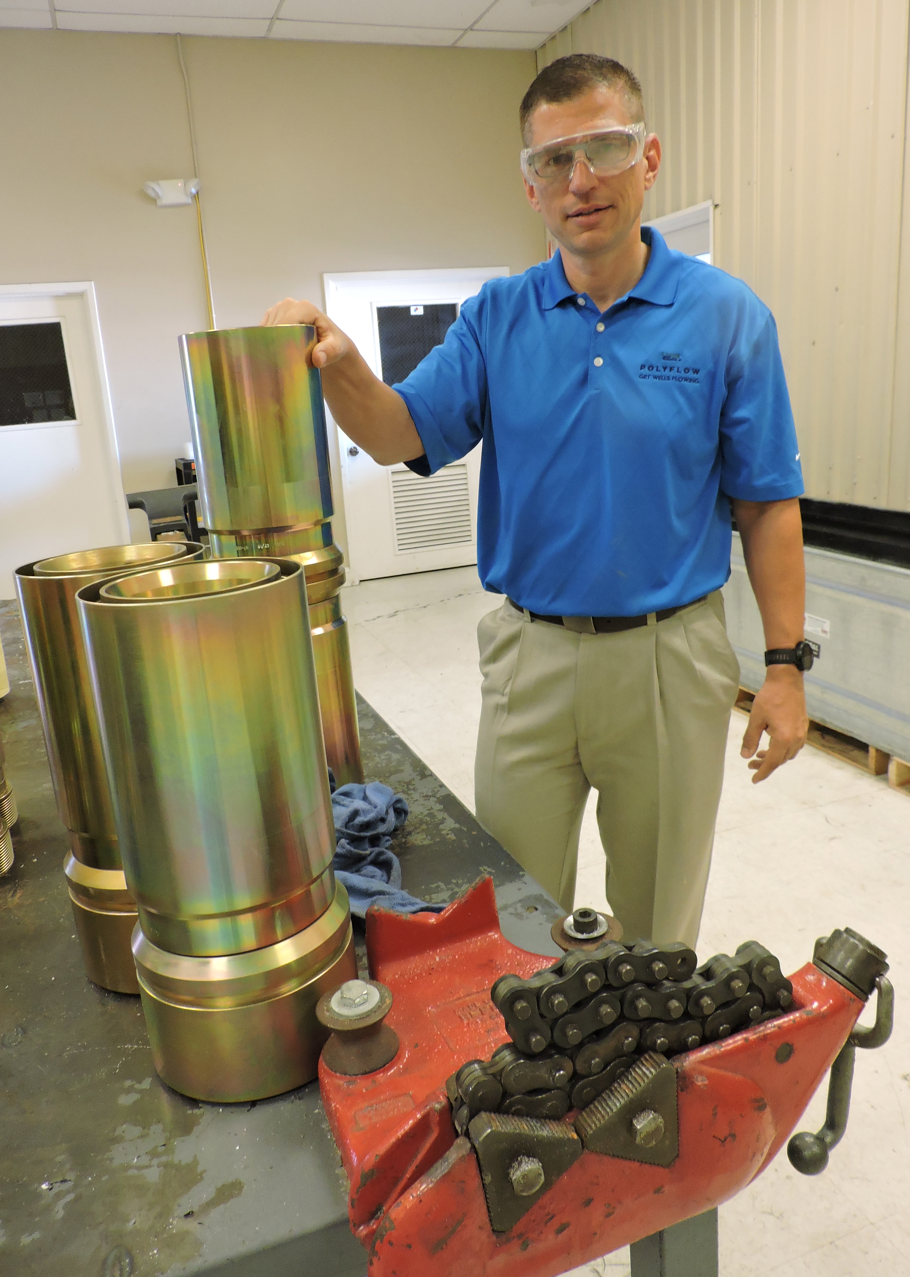 Aramid fiber reinforces Polyflow’s Thermoflex spoolable pipe. Holding a spool is Jeremy Hohn, U.S. director of sales for the company.